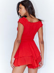 Romper Soft textured material Shirred waistband Ruffle detailing Elasticated neck and sleeves Good stretch   Fully lined
