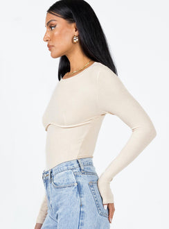 side view of model wearing Princess Polly Swenson Long Sleeve Bodysuit Beige Full Sleeves Crew Neck 