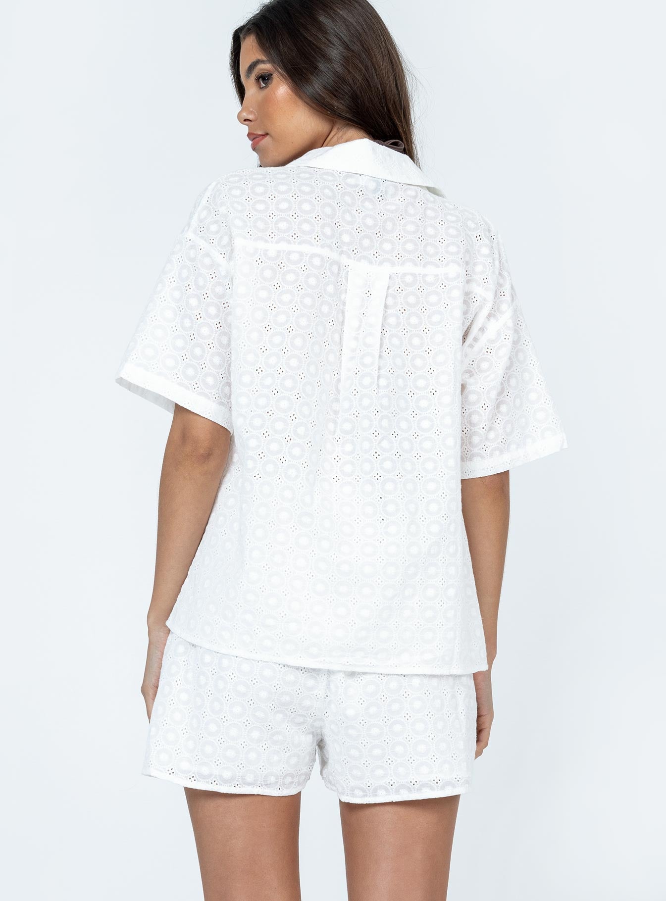 Shorts 100% cotton Delicate stitched material  Elasticated waistband  Twin hip pockets 