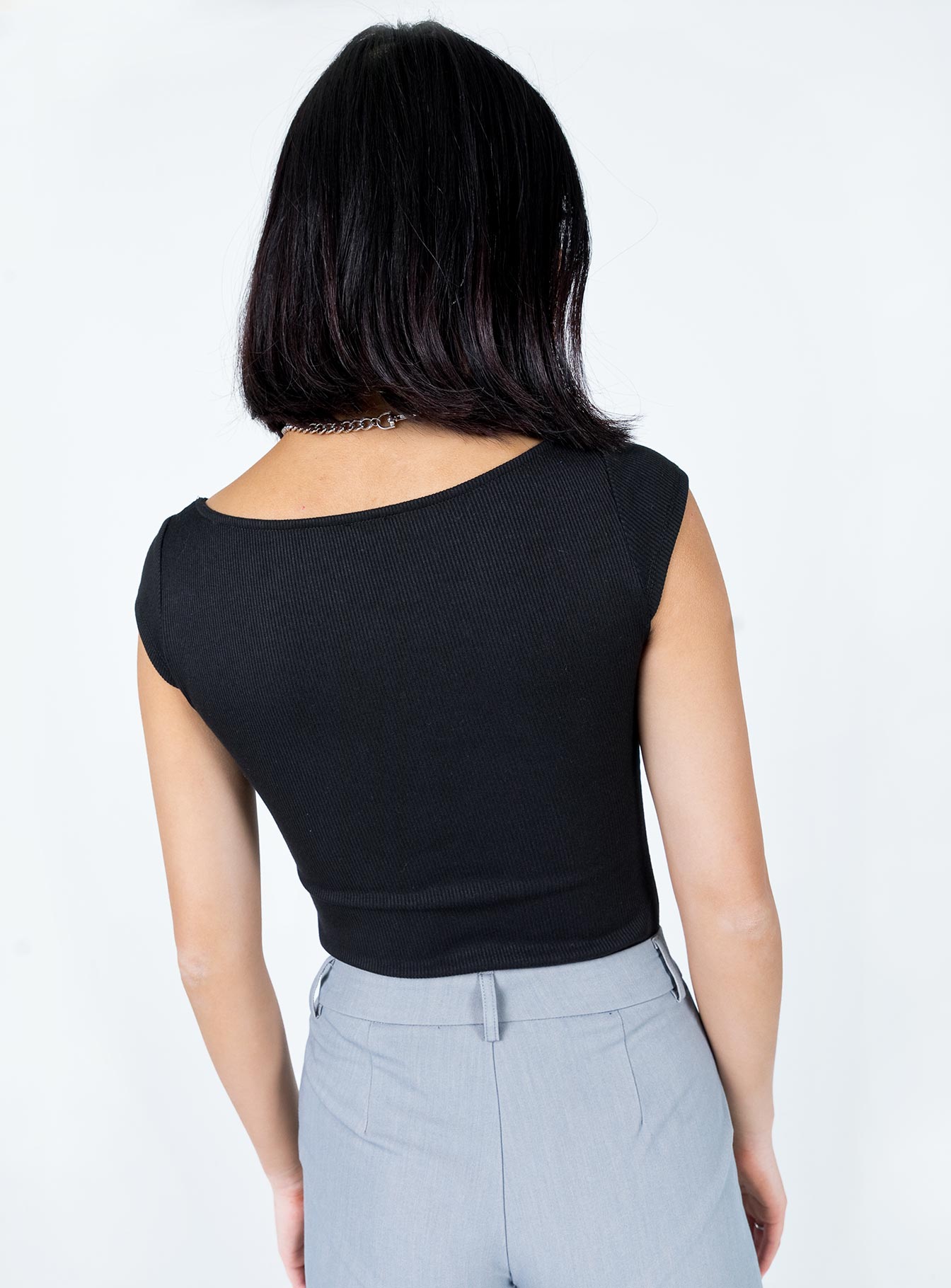 back view of model wearing Princess Polly Alden Bodysuit Black Short Sleeves V-Neck 