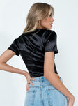 back view of model wearing Princess Polly Treyton Top Black Short Sleeves V-Neck 