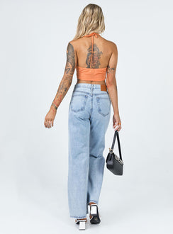 back view of model wearing Princess Polly Maple Flare Jeans Knee Rips Light Wash Denim Mid Rise 