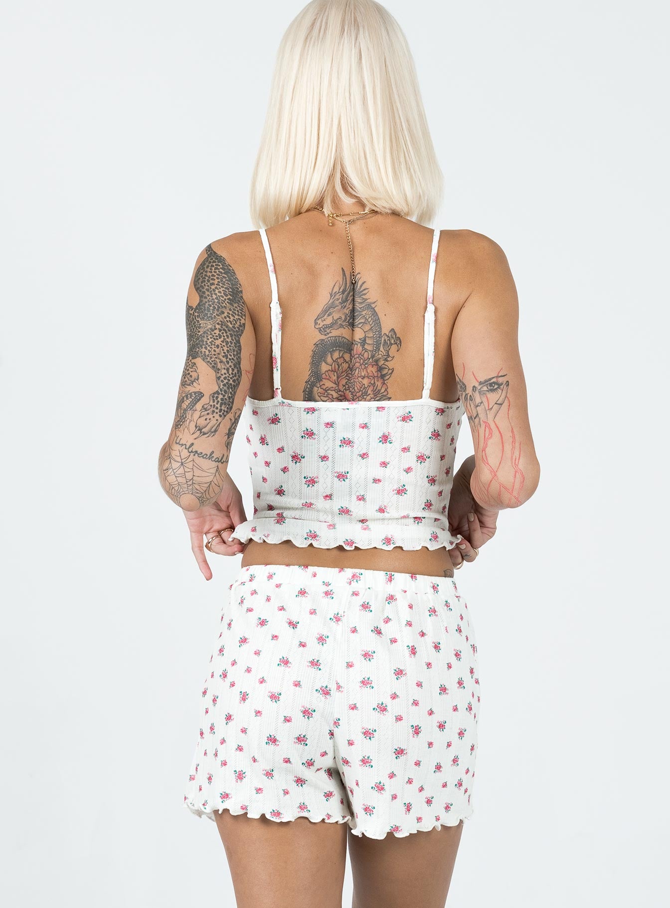 Matching set Floral print  Crop top Adjustable shoulder straps  Shorts  Elasticated waistband  Lettuce edge hem  Good stretch 