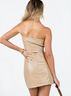 back view of model wearing Princess Polly Hailey PU Mini Skirt Beige Mini Skirts 