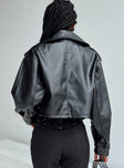 Cropped jacket Faux leather material Oversized collar Open front Press button fastening at cuff