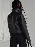 Cropped jacket Faux leather material High neck Zip & press button fastening Twin chest pockets Single button cuff