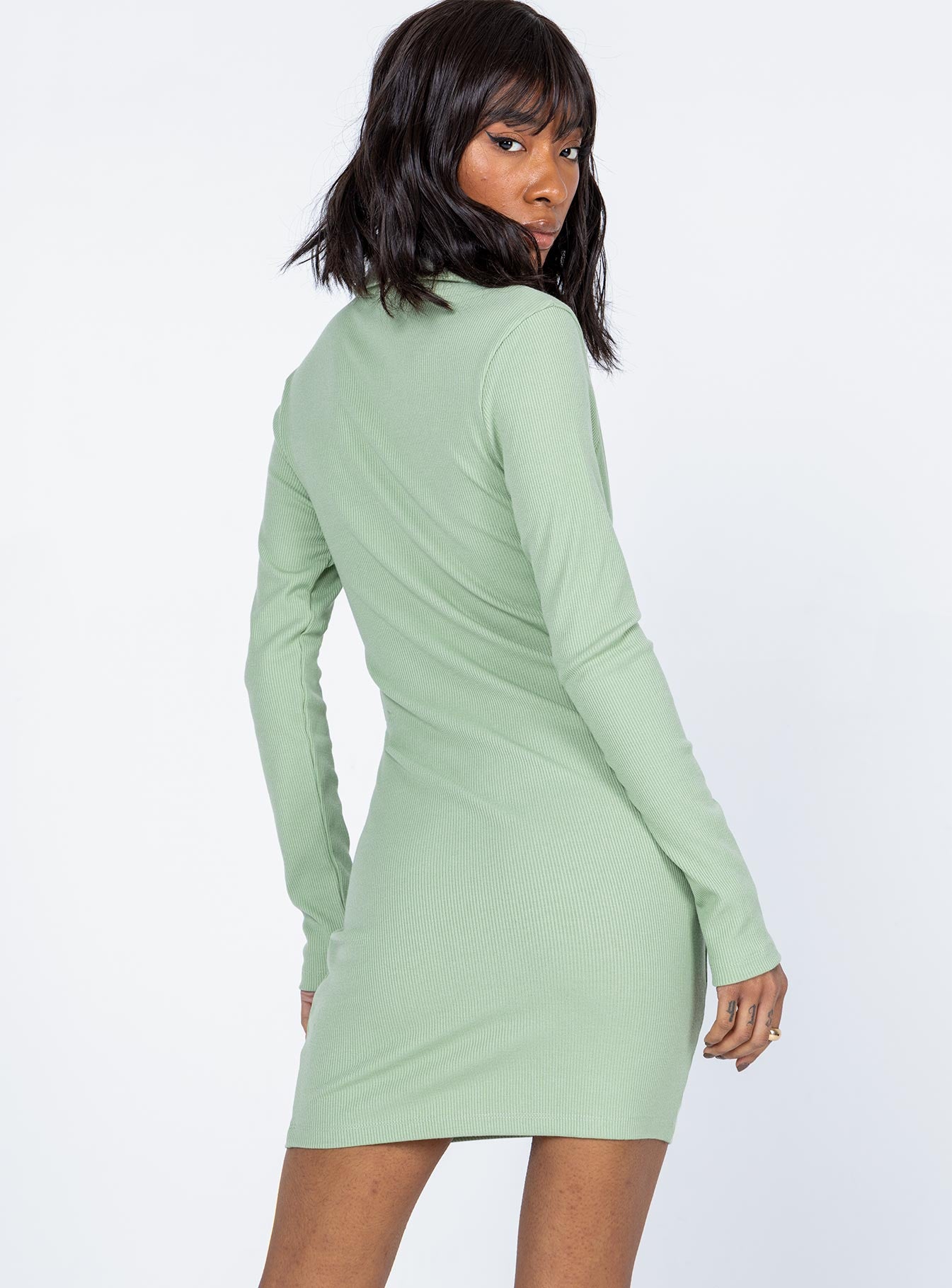 back view of model wearing Princess Polly Neveah Mini Dress Green 