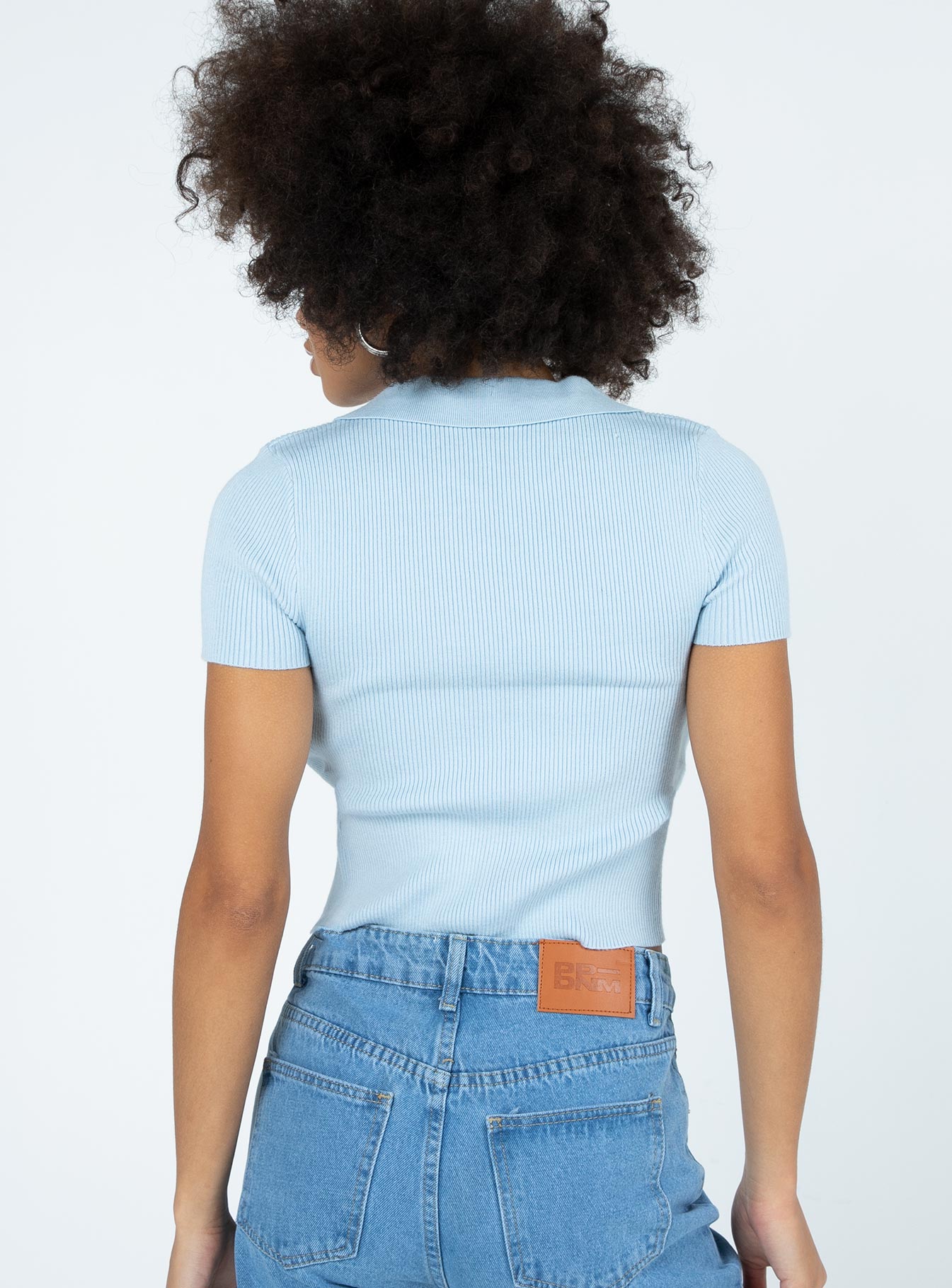 back view of model wearing Princess Polly Clayton Top Blue 