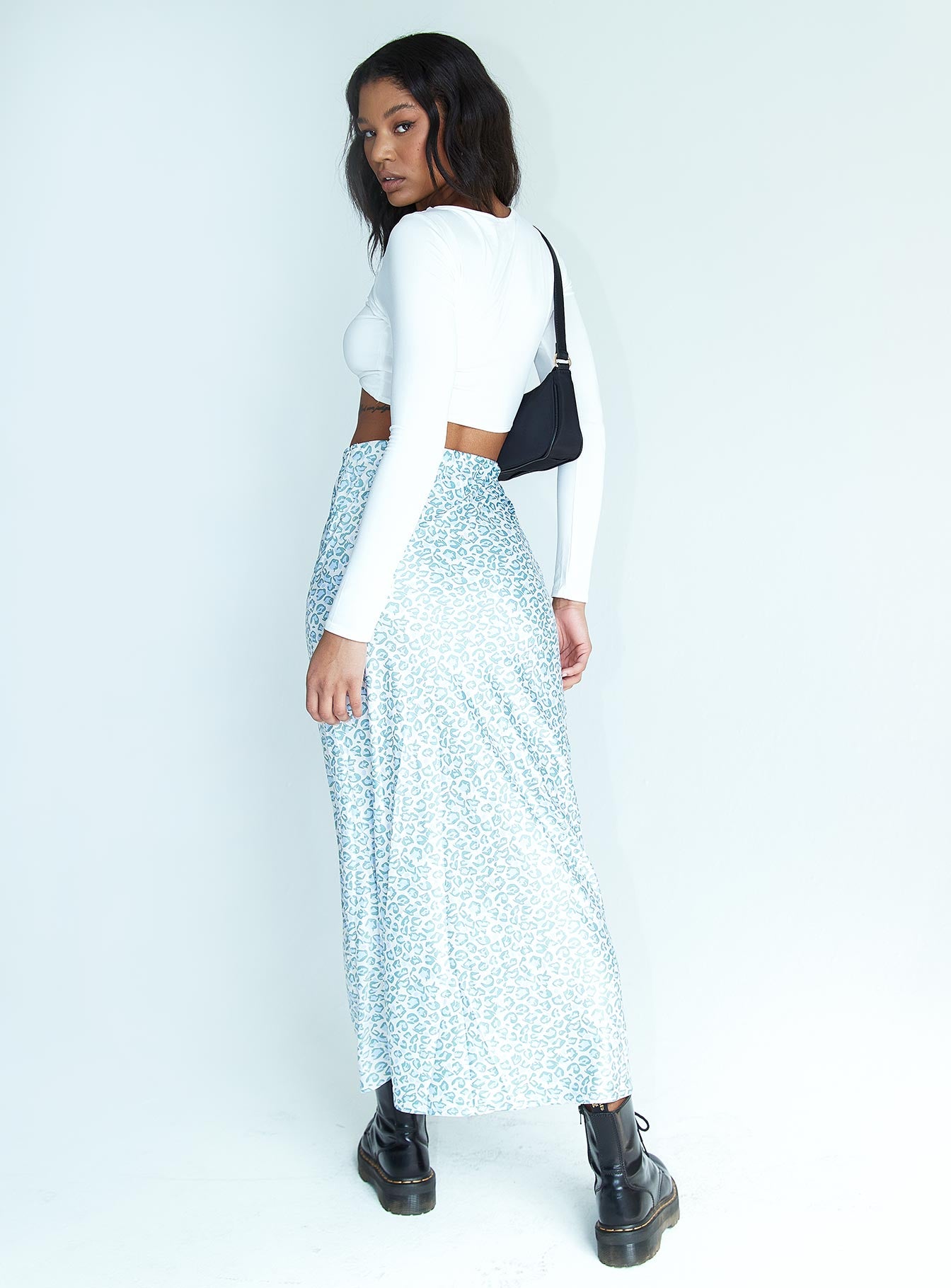 back view of model wearing Princess Polly Adah Maxi Skirt Beige 