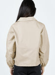 Jacket High neck Zip fastening at front Faux zip chest pocket  Twin hip pockets Drawstring waist Elasticated cuffs