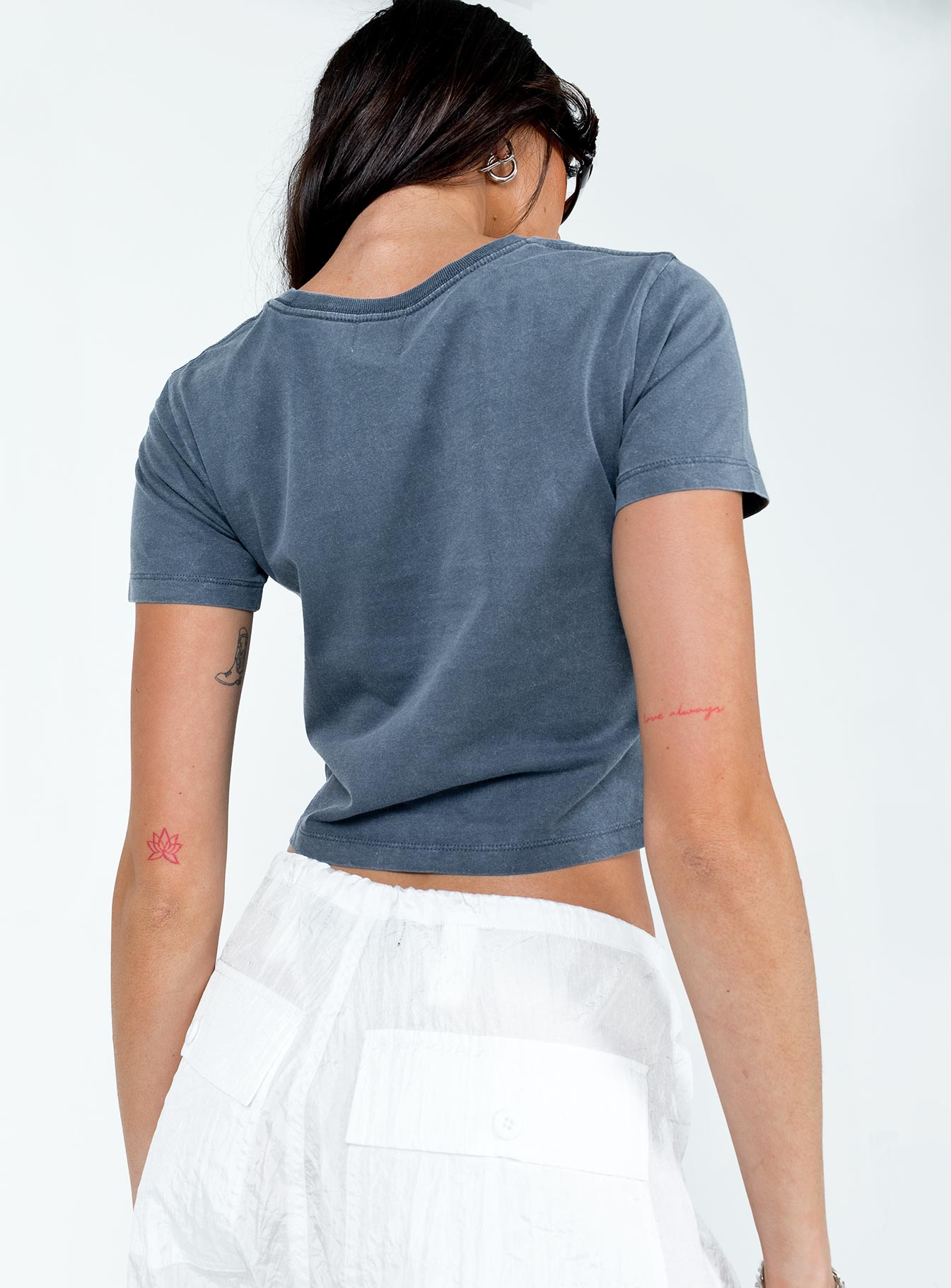 back view of model wearing Princess Polly Nevada Tee Navy Short Sleeves Crew Neck 