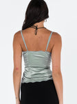 Top Satin and lace material Adjustable shoulder straps V neckline Button front fastening Curved hem