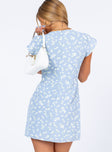 back view of model wearing Princess Polly Cartilla Mini Dress Blue Floral 