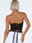 Strapless top Inner silicone strip at bust Zip fastening at back Distressed detailing Panel stitching Good stretch Unlined 