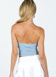 Strapless top Sparkly material Inner silicone strip at bust Asymmetrical pointed hem Good stretch Lined bust