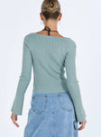 Blue top Ribbed knit material Scoop neck Stitching detail under bust Good Stretch Unlined 
