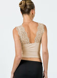 Crop top Lace material  Plunging neckline