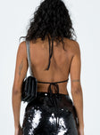 Halter top Embellished with sequins made from recycled plastic Tie fastening at neck & back Open back style