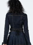 Denim jacket Dark wash denim Contrast stitch detail Lace up detail at hem & sleeves Front zip fastening