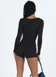 Black long sleeve playsuit Ribbed material Square neckline Invisible zip fastening at back Good stretch