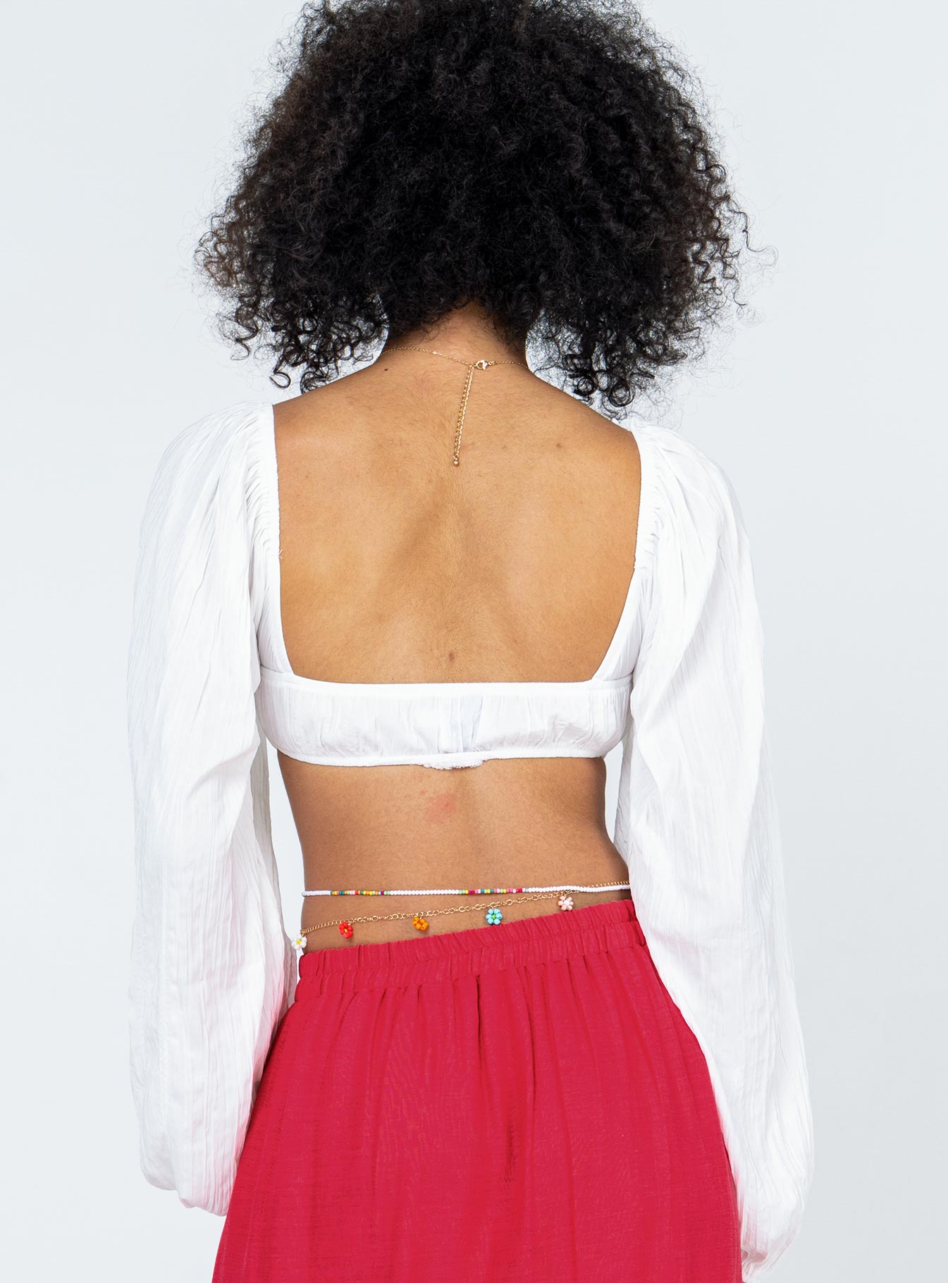 back view of model wearing Princess Polly Kerry Long Sleeve Top White 