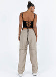 Cargo pants High rise Elasticated waistband with drawstring Six pocket design Straight leg
