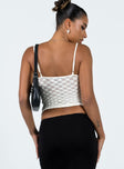 Crop top Textured knit material Adjustable shoulder straps   Good stretch