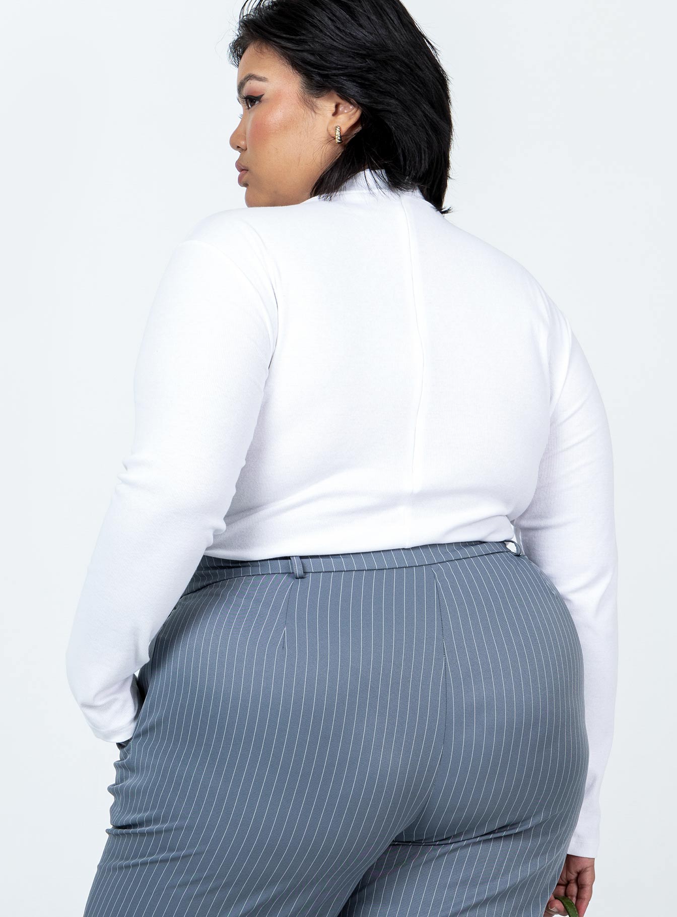 back view of model wearing Princess Polly Maleny Long Sleeve Bodysuit White Curve Full Sleeves Crew Neck 