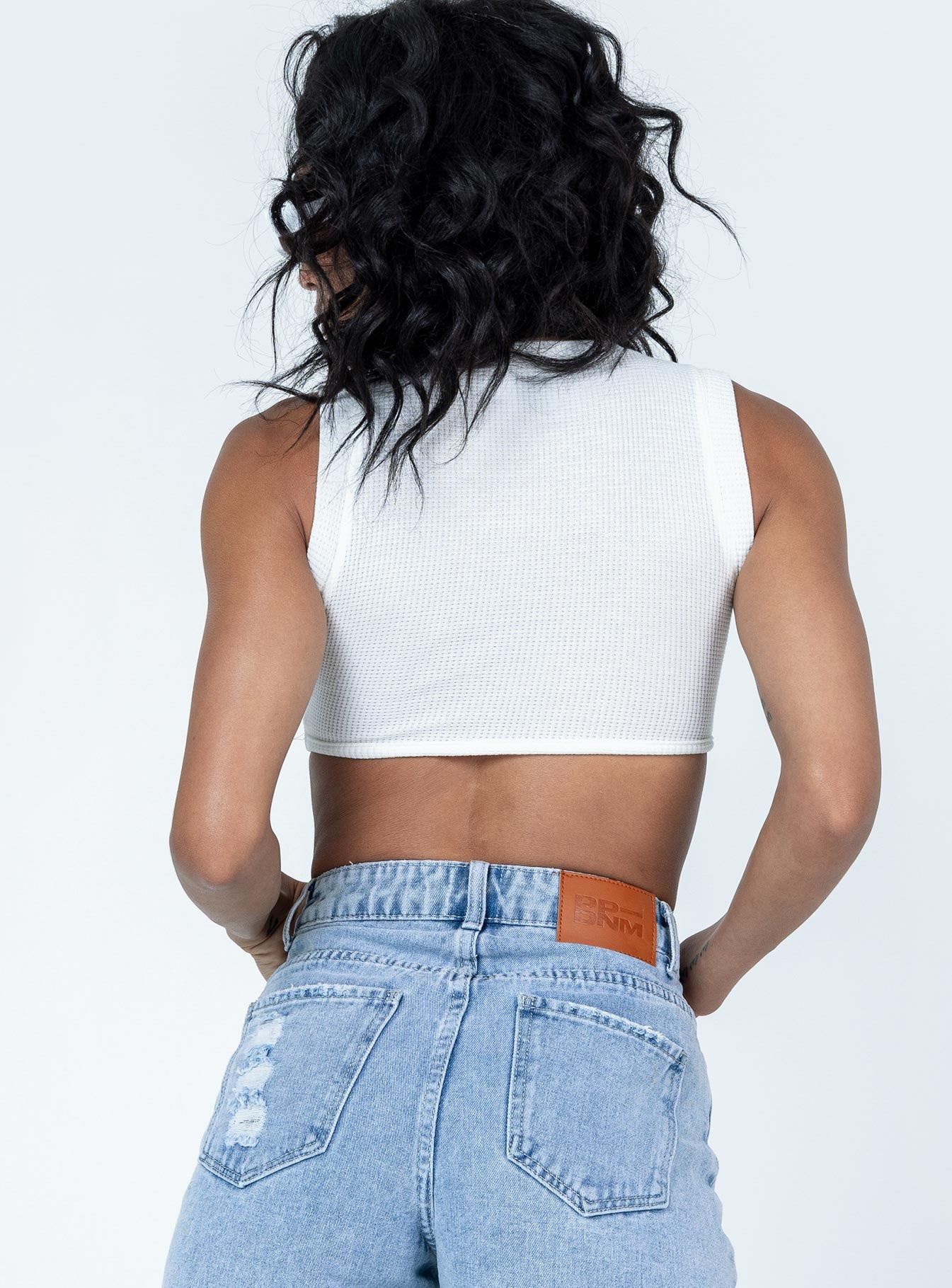 back view of model wearing Princess Polly Monterey Top White Sleeveless Crew Neck 
