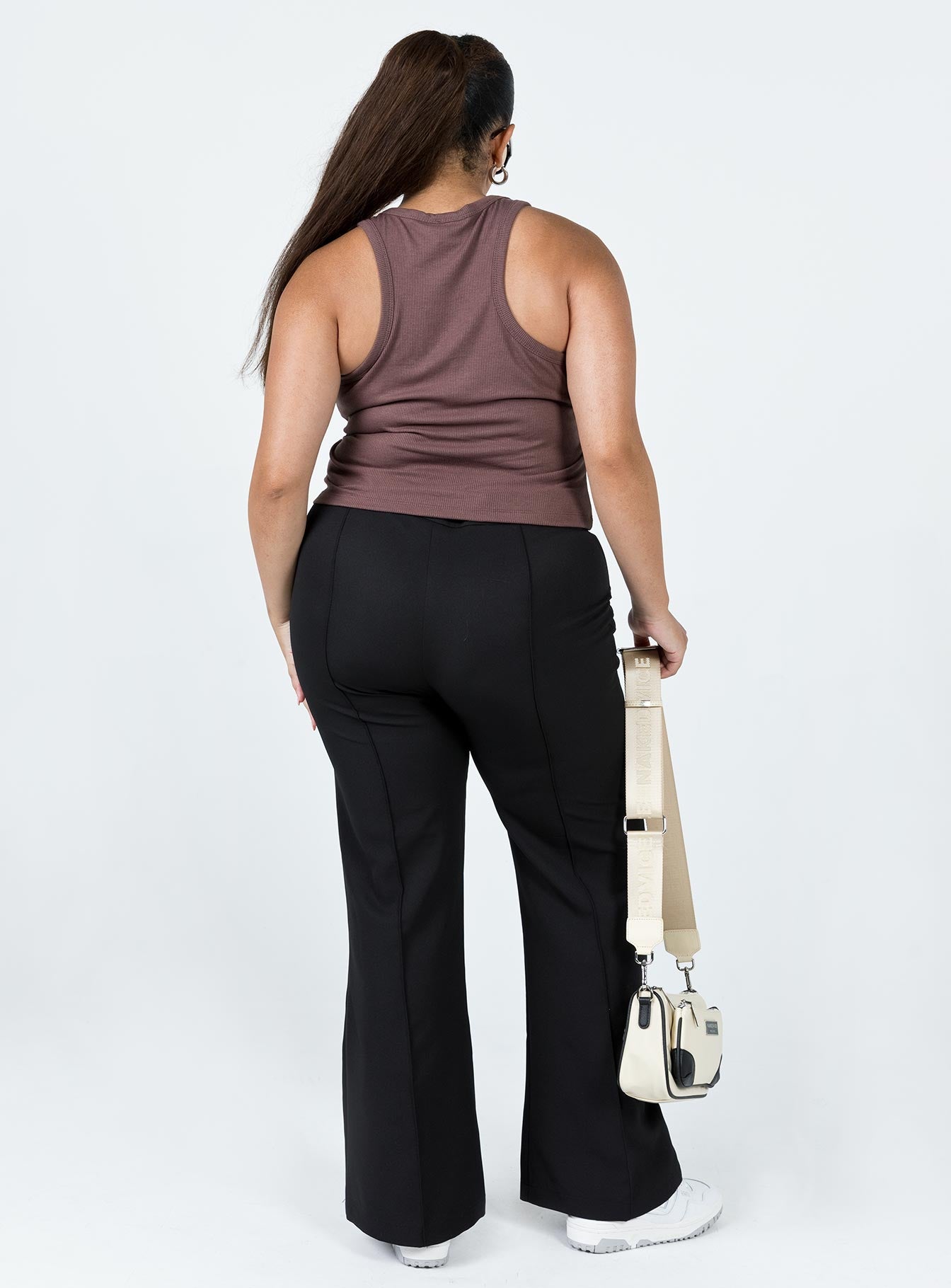 back view of model wearing Princess Polly Jensen Pants Black Curve 