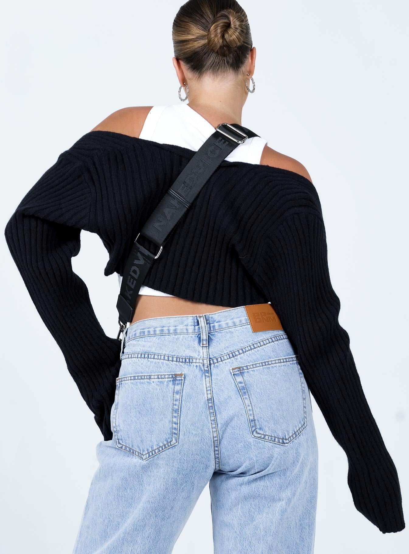 back view of model wearing Princess Polly Aytan Bolero Sweater Black Cropped 