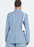 Blue blazer Lapel collar Button fastening at front Shoulder pads Faux hip pockets Split at back