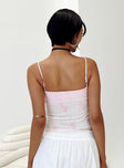 Pink crop top Mesh and lace material Floral print Adjustable shoulder straps V neckline Bow detail at bust Good stretch Fully lined