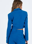 Blue blazer Ribbed material Lapel collar Single button fastening at front Chest pocket Padded shoulders
