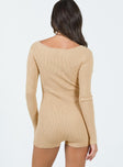 Long sleeve romper Ribbed material  Button front fastening   Cut out detail down front  Raw cut hem 