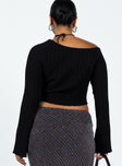 Long sleeve top Ribbed knit material  Off the shoulder design  Flared sleeves Good stretch  Unlined 