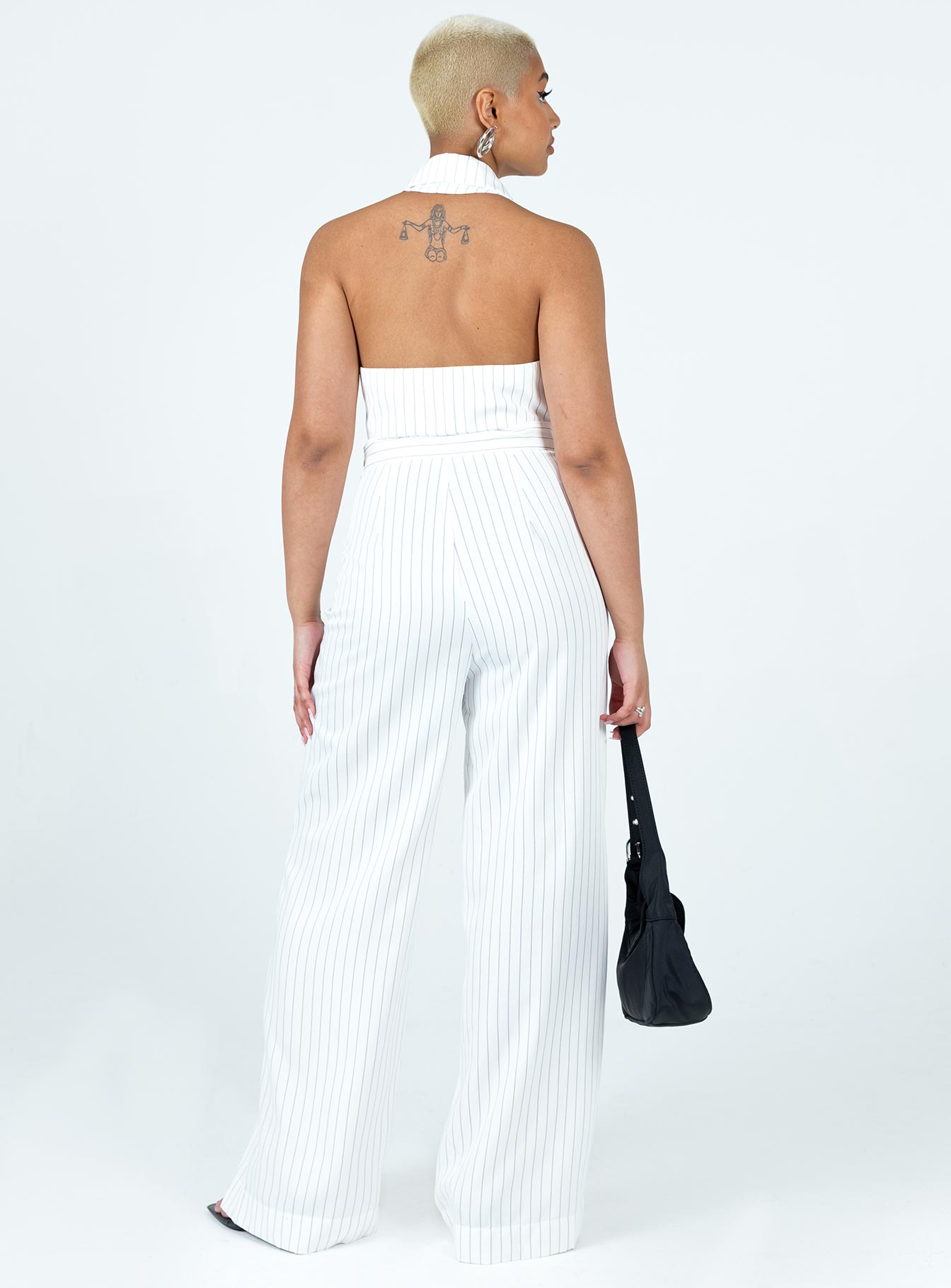 White matching set Pinstripe print Vest top Halter neck Hook & eye fastening at front Tailored pants Invisible zip fastening at side Wide leg