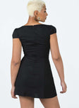 Front view of model wearing  front Princess Polly Asymmetric Neckline  Alora Mini Dress Black