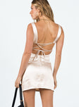 Mini dress Silky material Square neckline Thick straps Adjustable lace-up back with tie fastening Zip fastening at back Low back