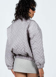 Bomber jacket Quilted material Classic collar Zip fastening Twin hip pockets Elasticated waistband & cuffs