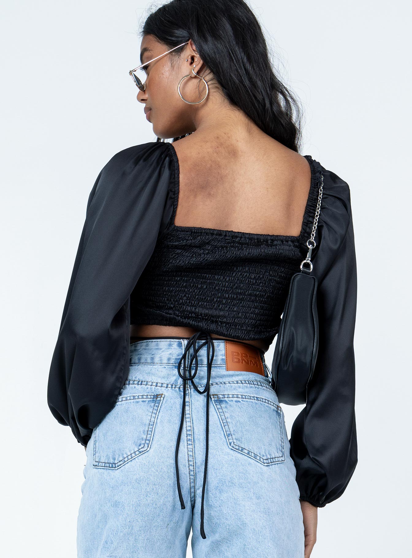 back view of model wearing Princess Polly Nikita Long Sleeve Top Black Full Sleeves Sweetheart 