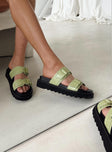 Black and green sandals Double upper strap Both adjustable Chunky treaded sole Padded footbed