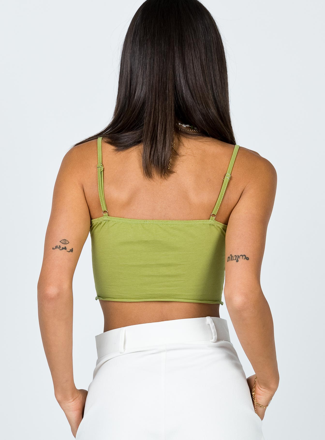 back view of model wearing Princess Polly Simple Things Crop Top Green 