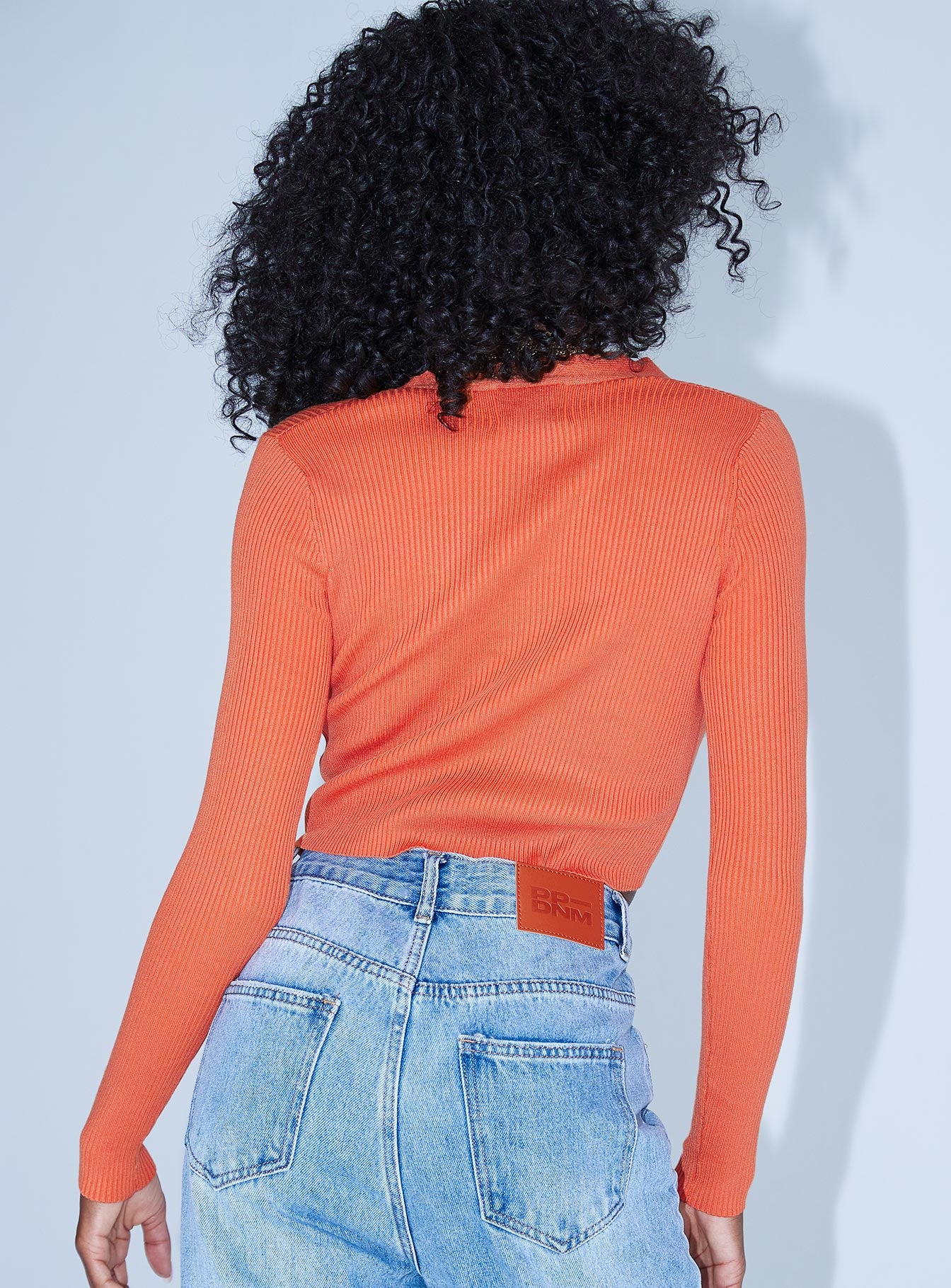 back view of model wearing Princess Polly Honesty Long Sleeve Top Rust 