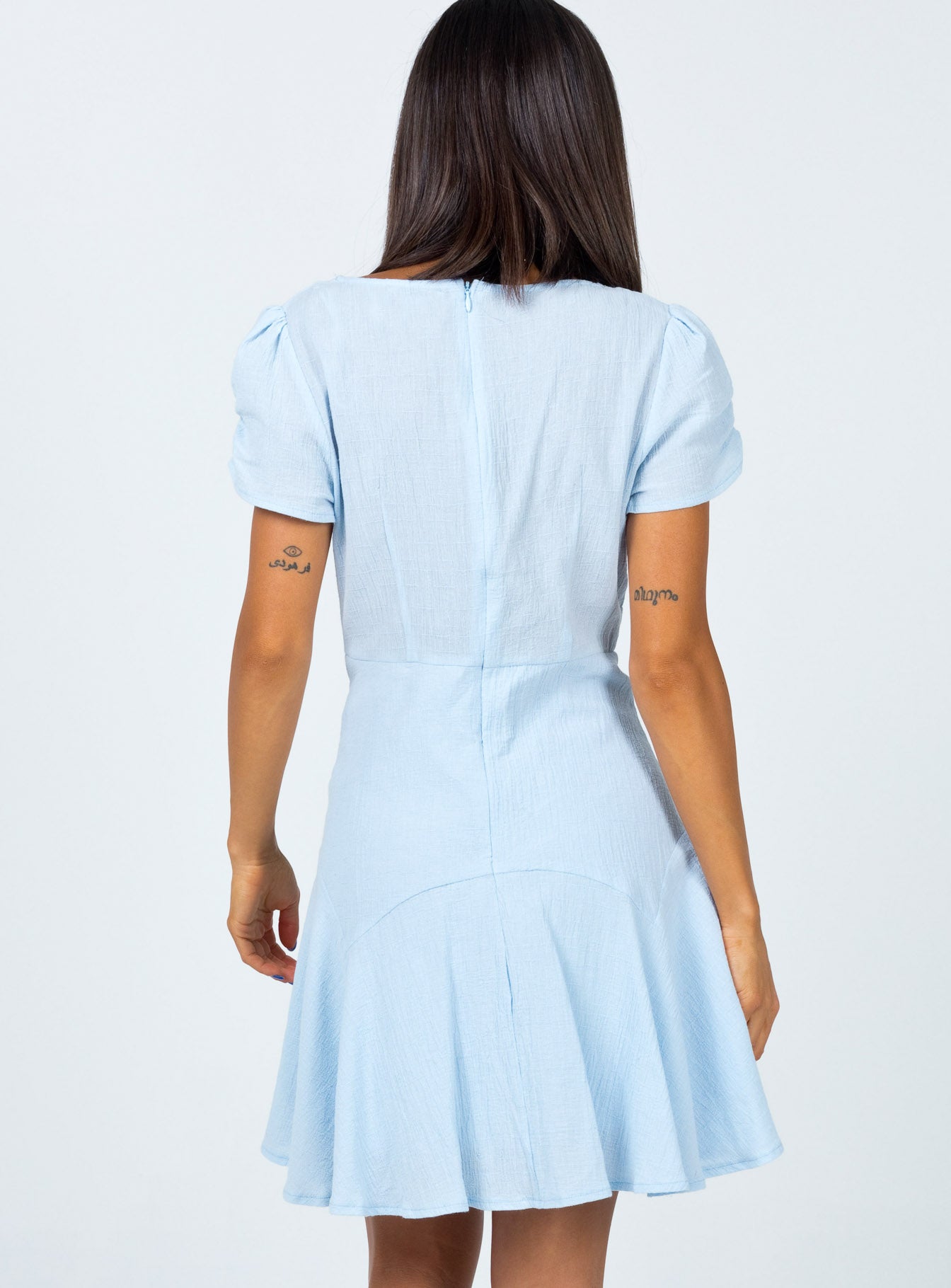 back view of model wearing Princess Polly The Sting Mini Dress Baby Blue 