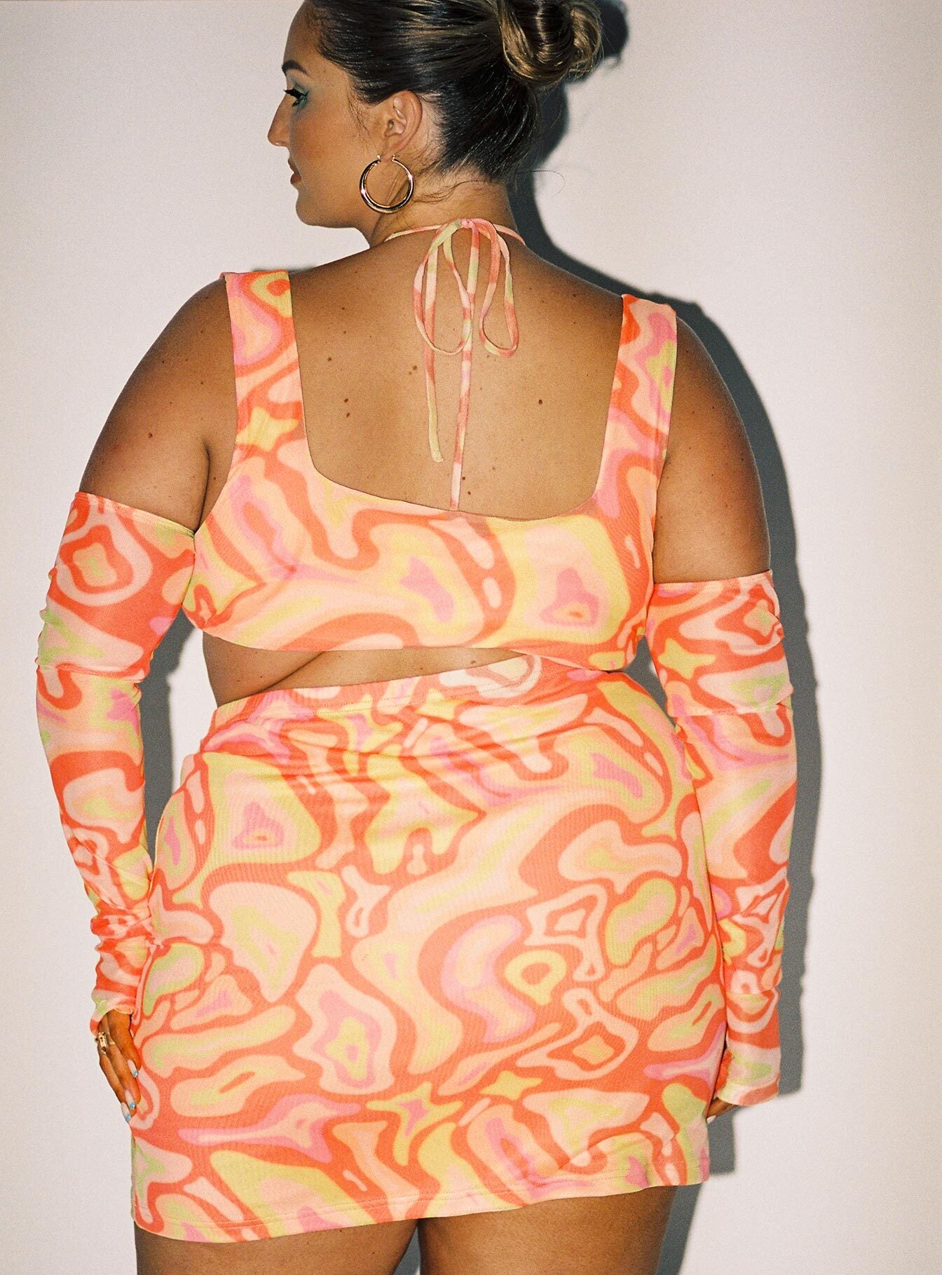 back view of model wearing Princess Polly Balanced Mini Skirt Multi Curve 