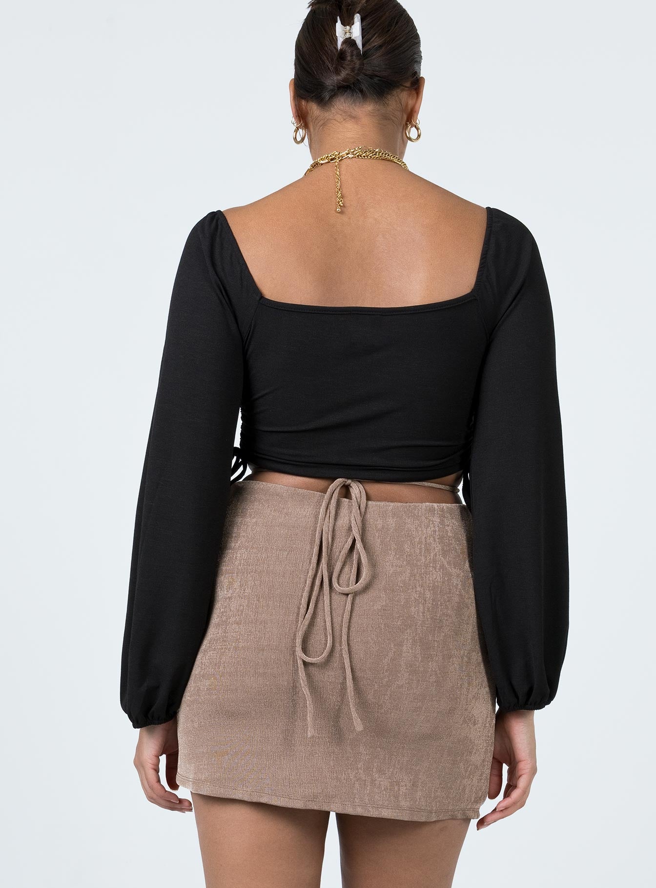 back view of model wearing Princess Polly Maisie Mini Skirt Brown 