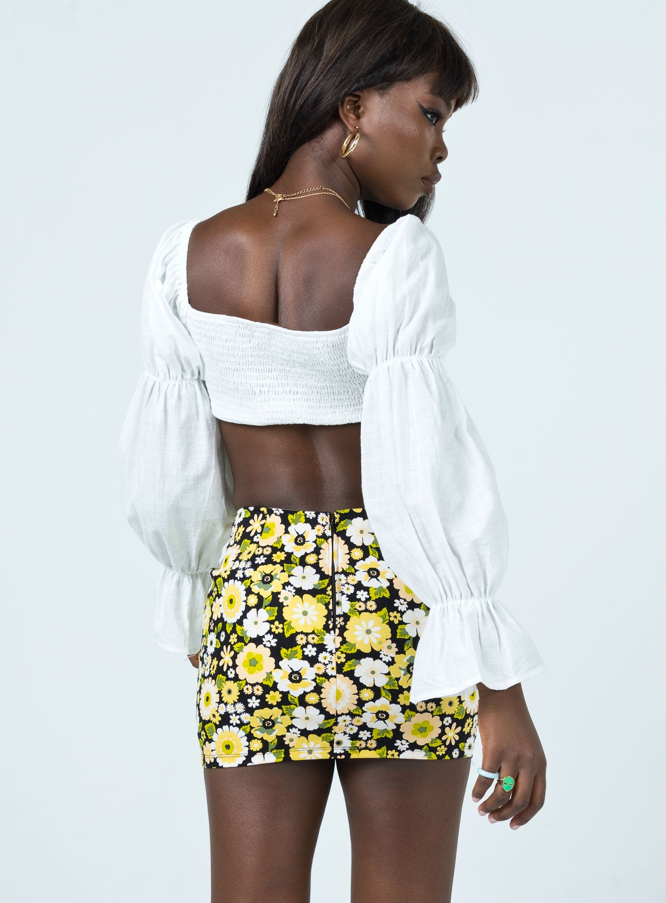 back view of model wearing Princess Polly Motel Ima Skirt Retro Floral 