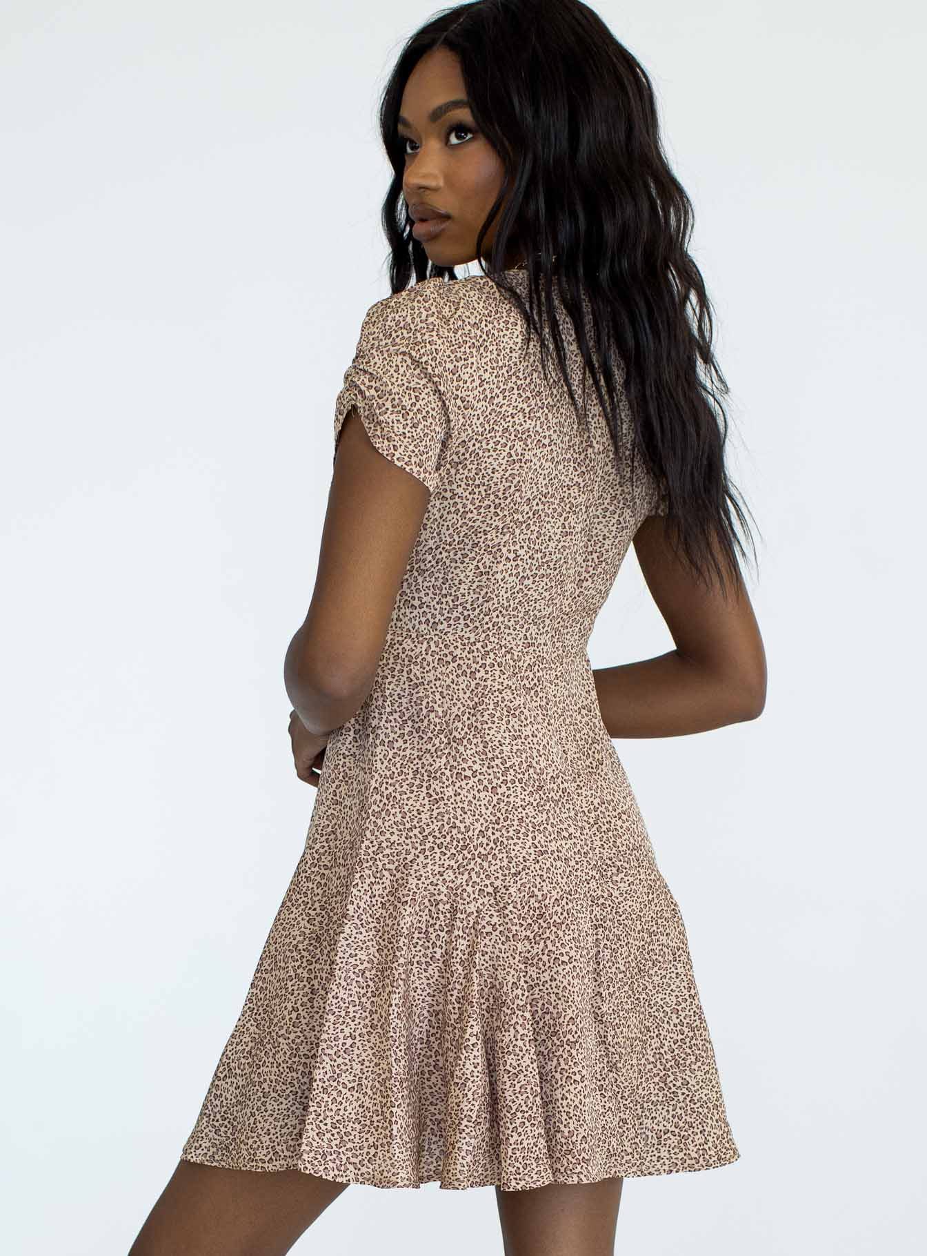back view of model wearing Princess Polly The Sting Mini Dress Leopard 