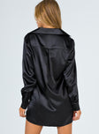 Front view of model wearing  front Princess Polly Asymmetric Neckline  90210 Satin Shirt Mini Dress Black Eco